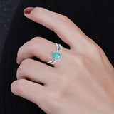 Wholesale Women's Oval Turquoise & Silver Feather Metal Ring - Assorted Sizes