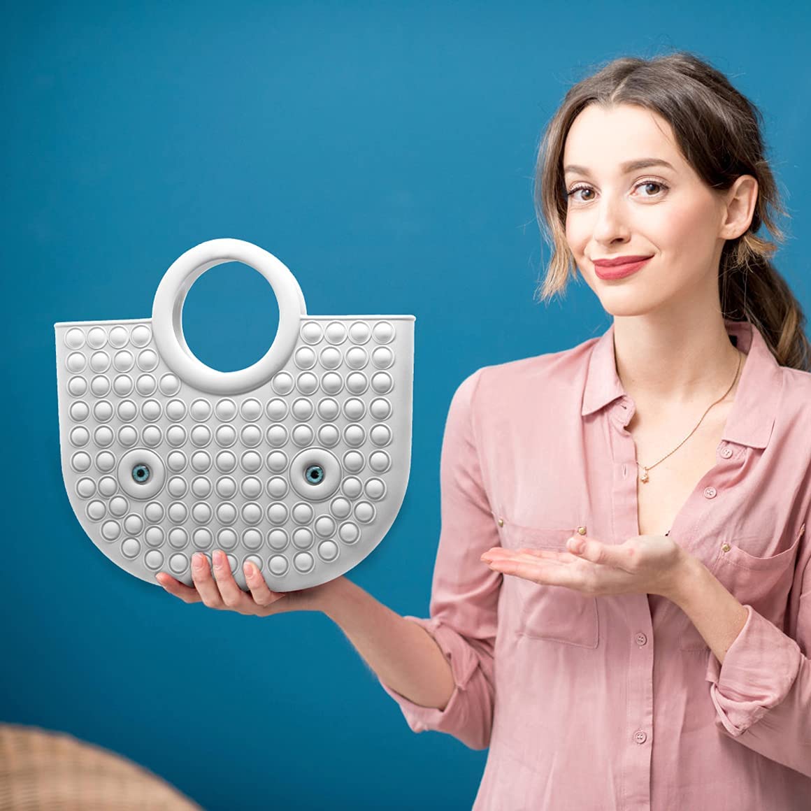 White Pop it Fidget Tote Bag in hands of a model