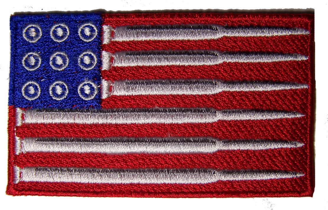 Wholesale RED WHITE & BLUE AMERICAN FLAG BULLET SHELL EMBROIDERED PATCH ( sold by the piece )